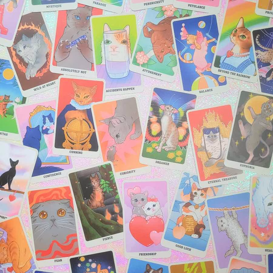 Illustrated oracle cards from Feline Mystique by Jennifer Sodini